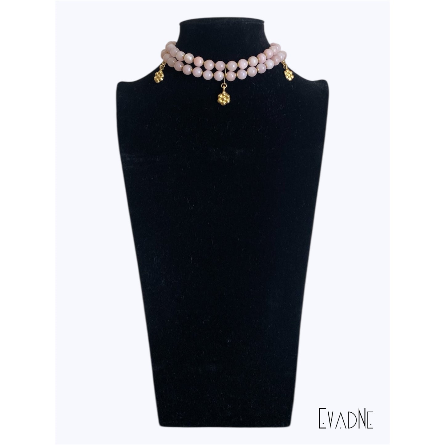 8mm rose quartz beads with brass bead caps and flower charms