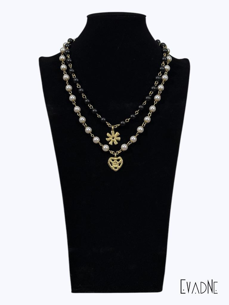 Japanese Pearl necklace with Adinkra Onyankopon charm