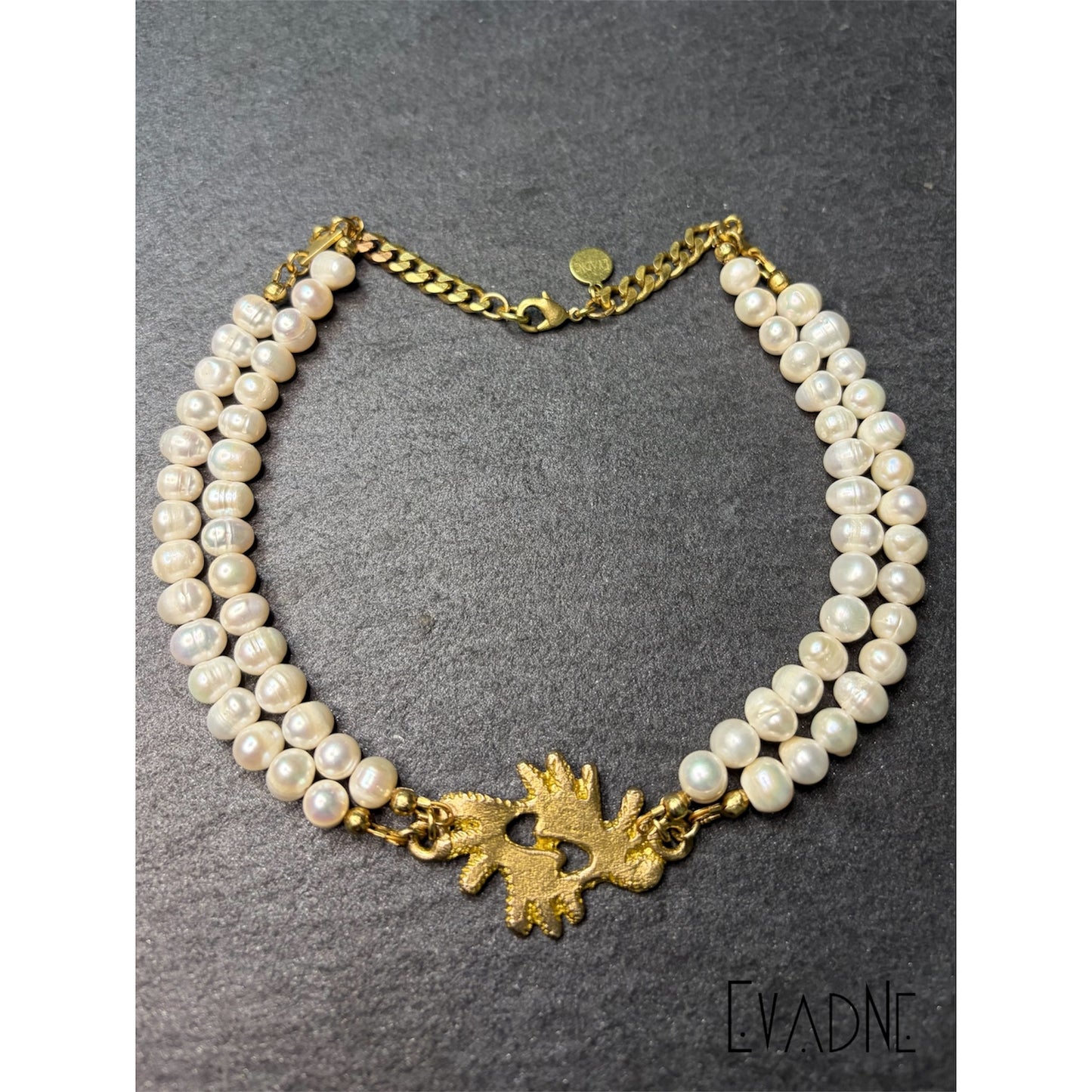 Double-Strand Pearl Necklace with Bi Nka Bi Charm