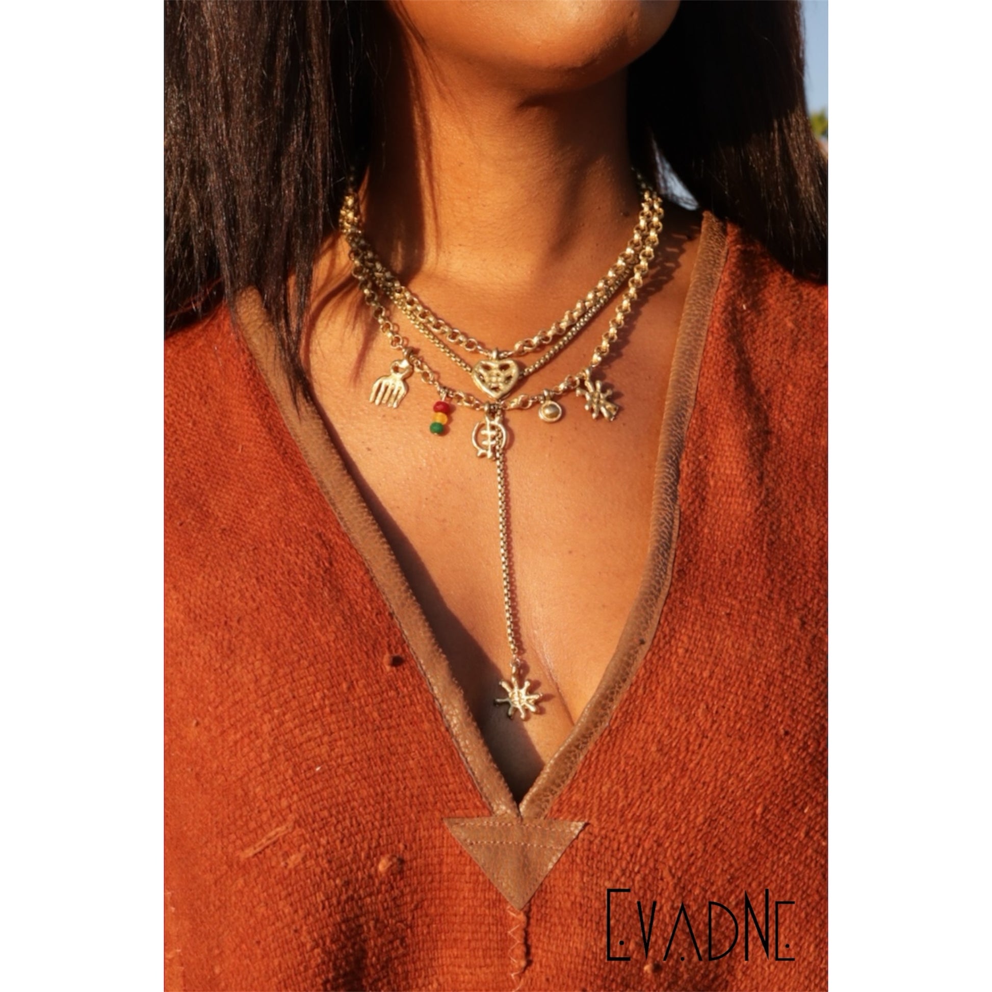 Ananse Ntontan Adinkra symbol charm representing wisdom and creativity
