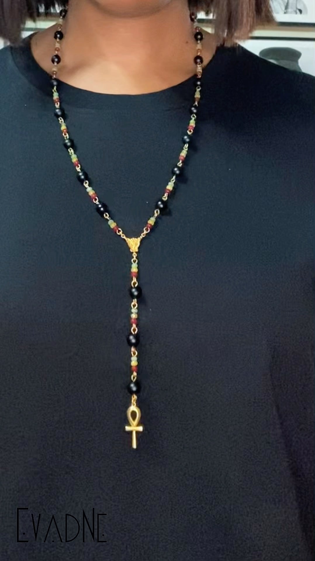 layered black agate rosary worn as ancestral ritual jewelry