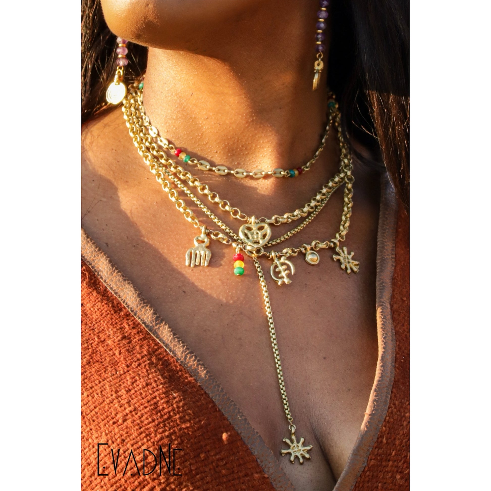 layered jade Gucci link necklace worn at the collarbone