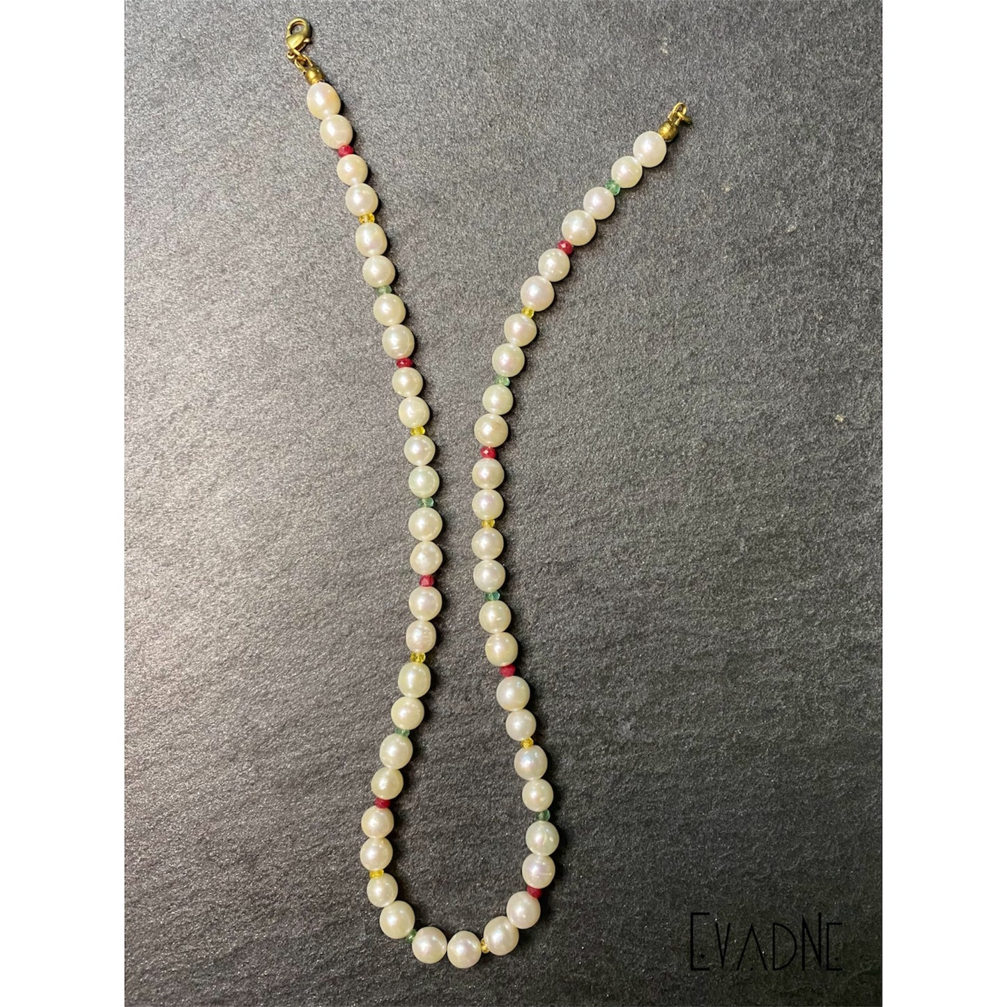 Freshwater pearl necklace with rubies emeralds and sapphires