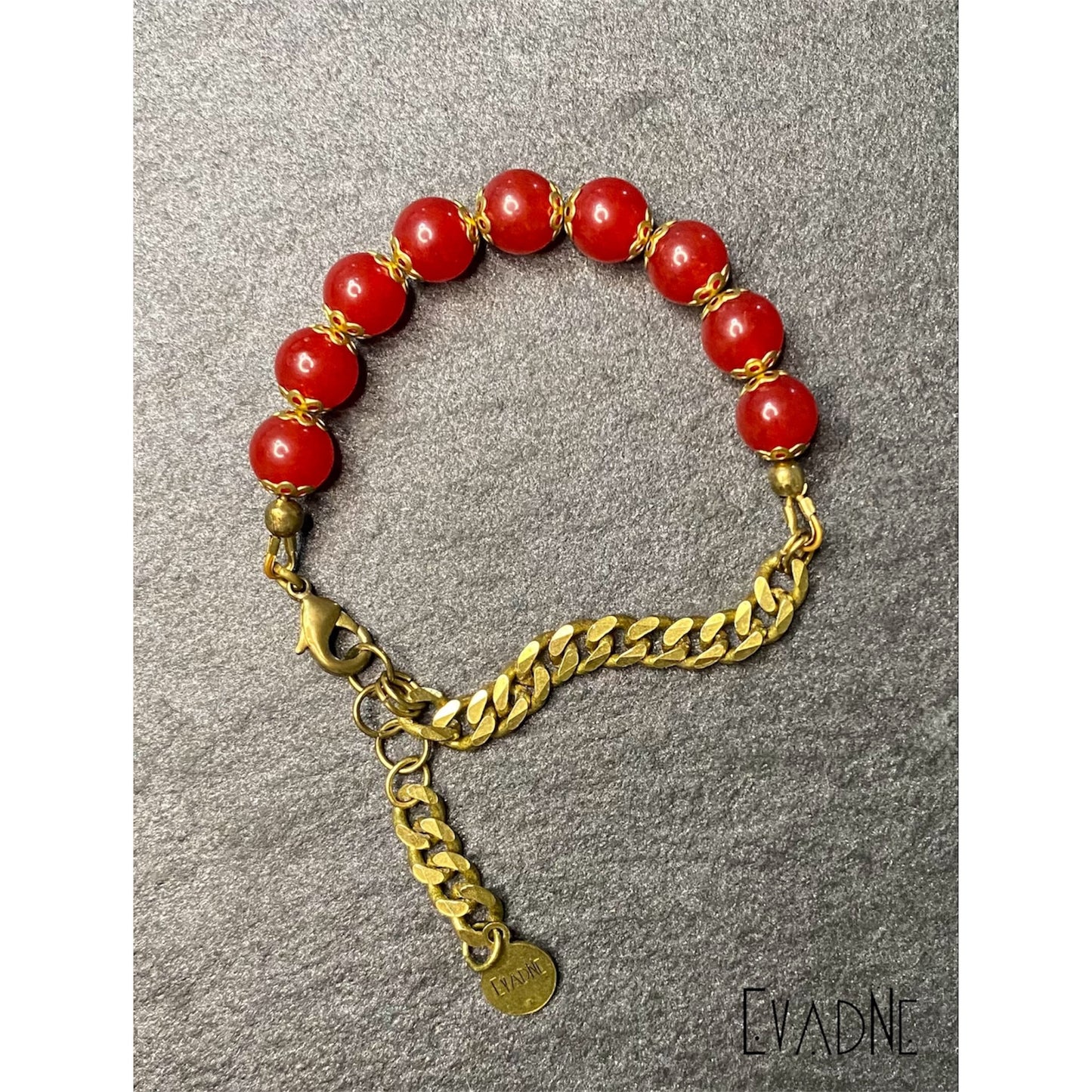red jade protection bracelet with brass accents