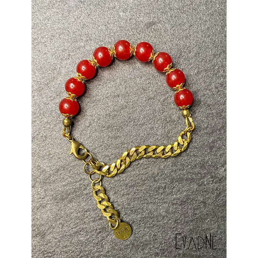 red jade protection bracelet with brass accents