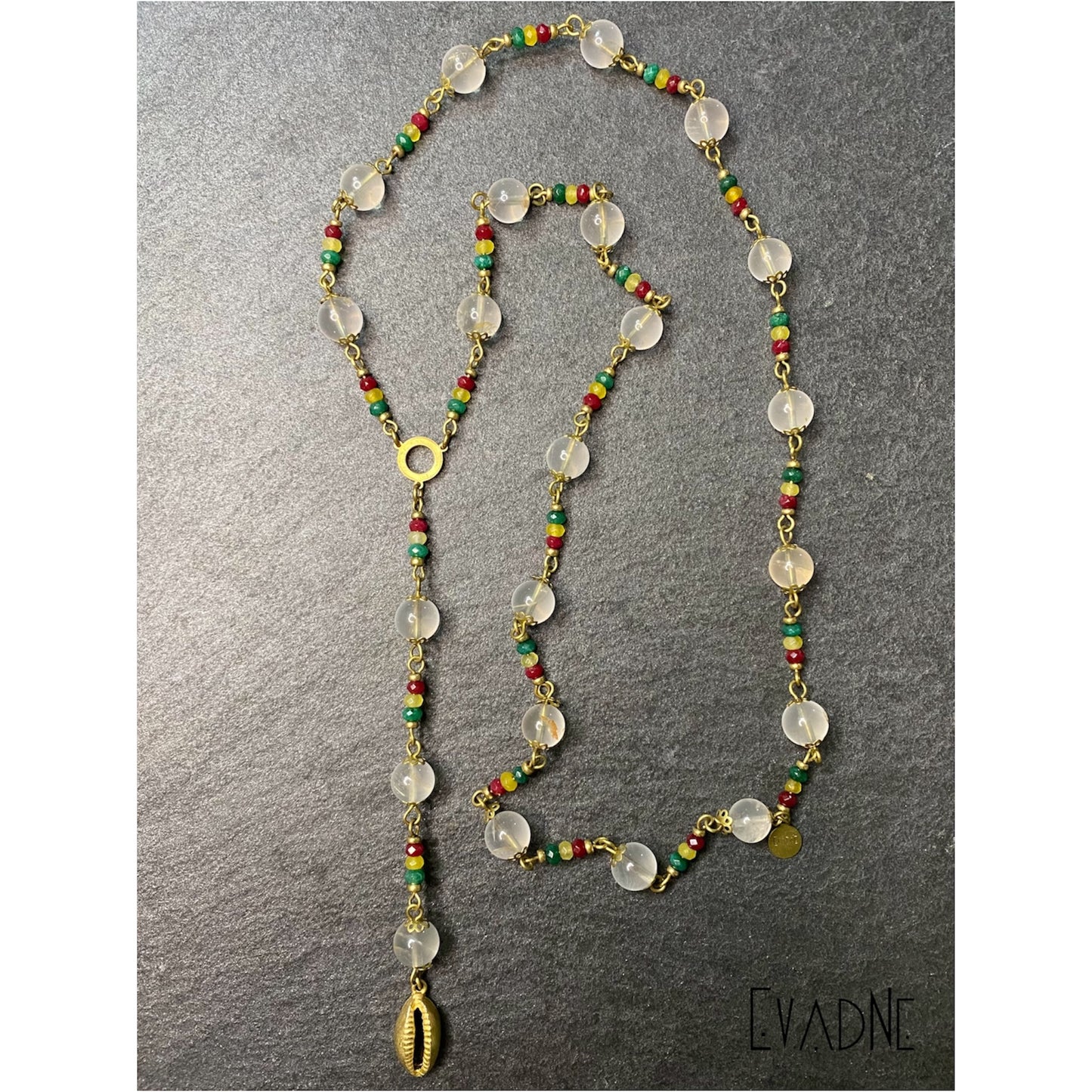 clear quartz rosary necklace with Rasta jade and cowrie shell