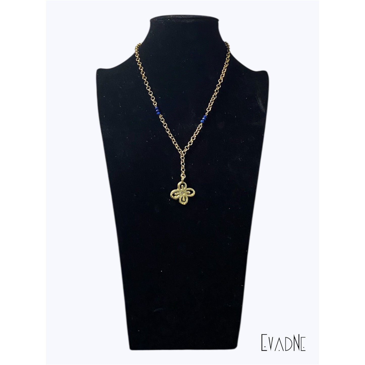 Brass lapis lazuli abundance necklace on black mannequin