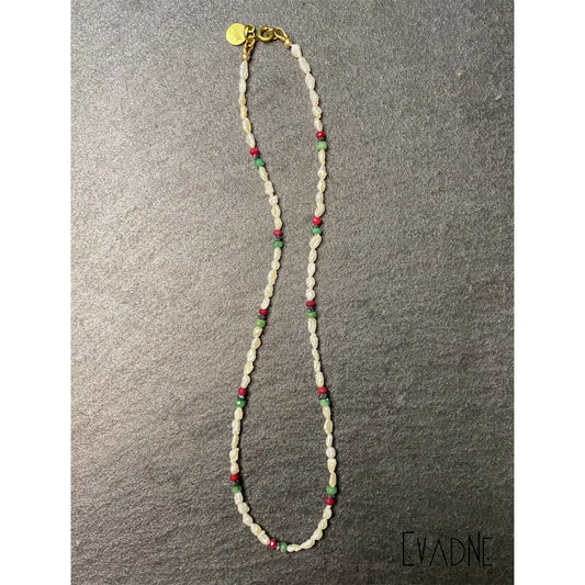 white Japanese rice pearl necklace with ruby emerald and black diamond accents