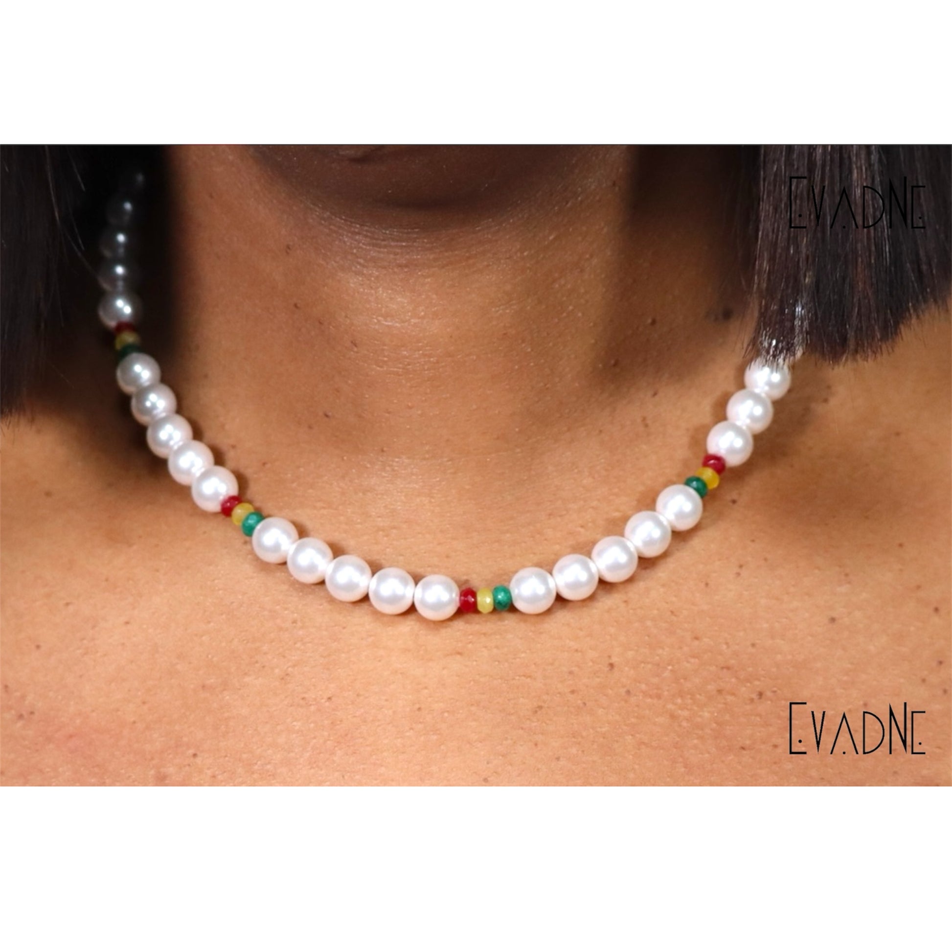 layered pearl and jade necklace worn at the collarbone