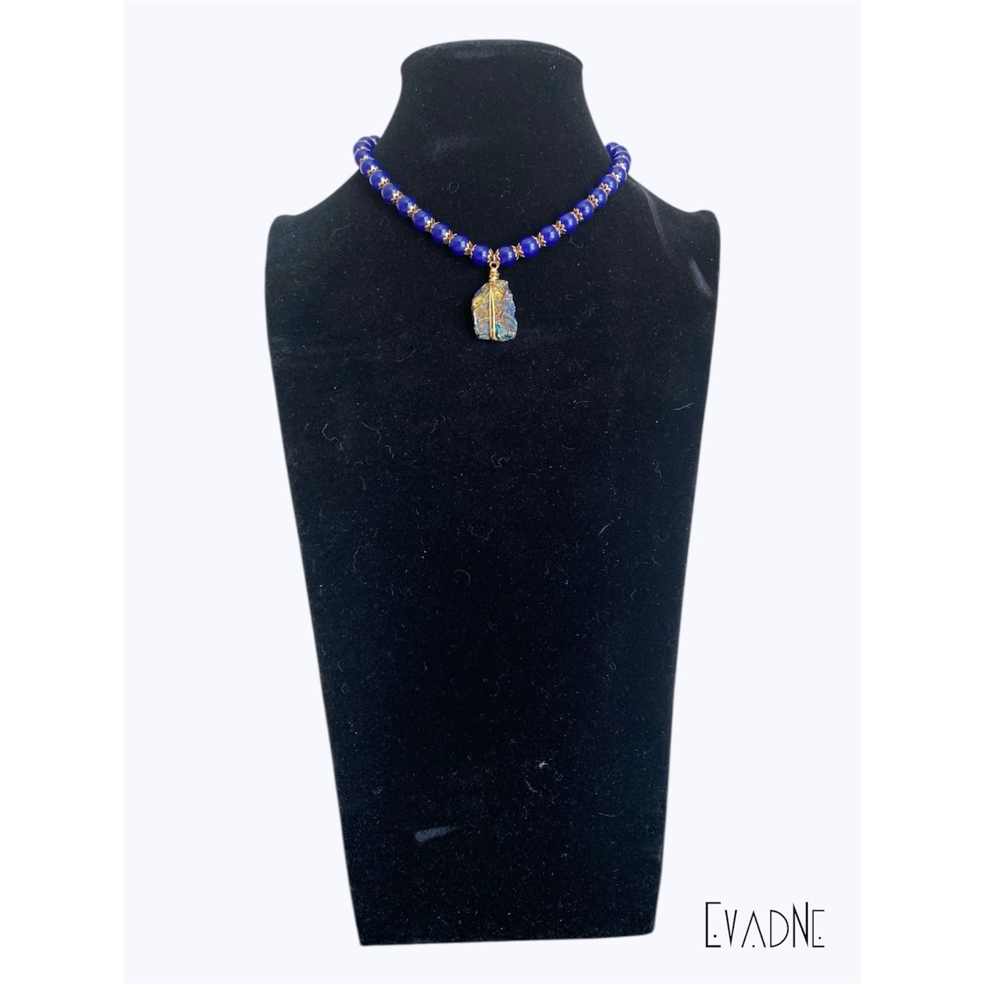 jade throat chakra necklace with raw peacock ore on black mannequin