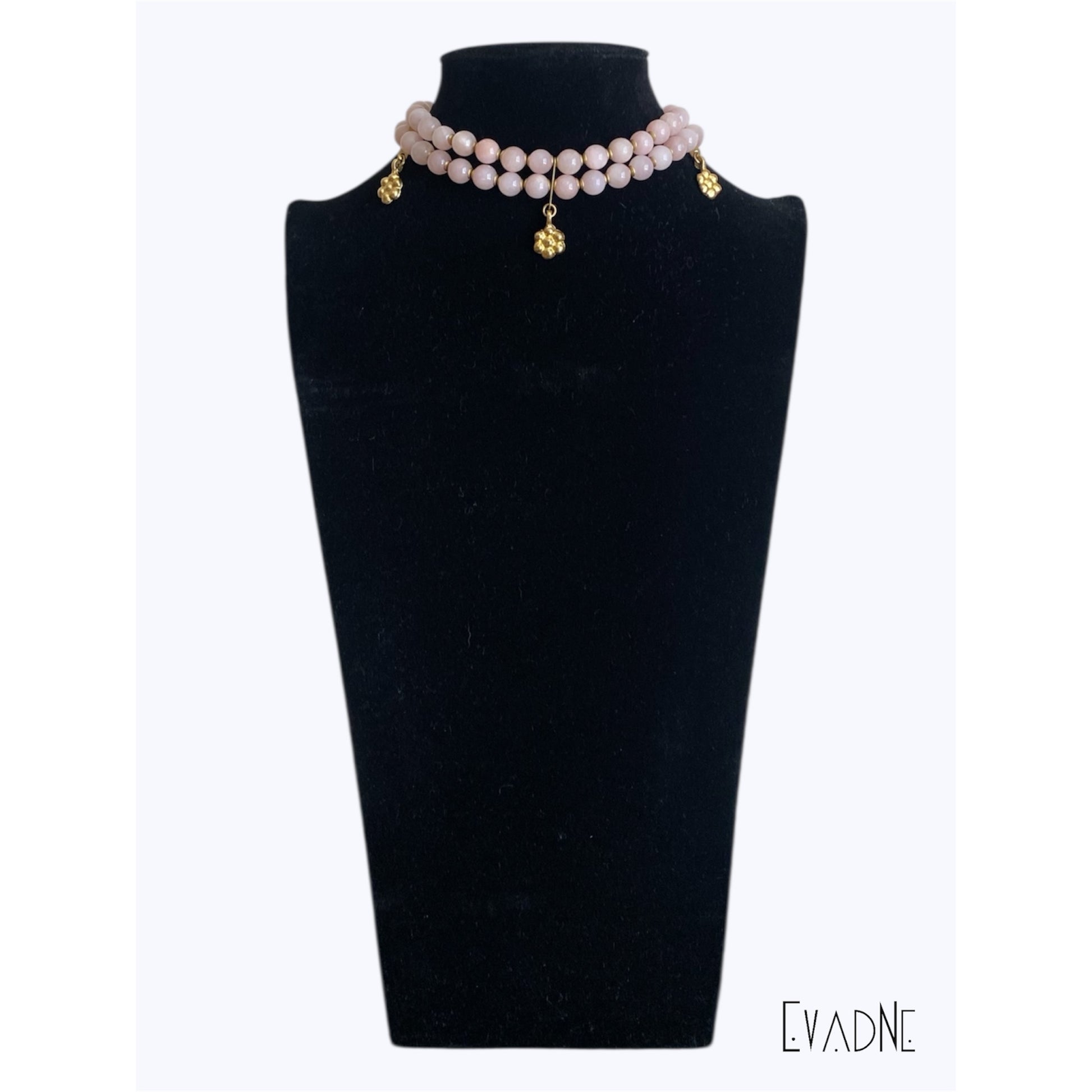 8mm rose quartz beads with brass bead caps and flower charms