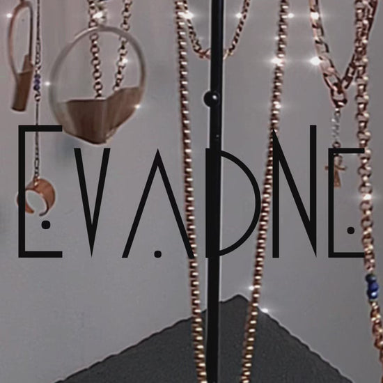 Carousel of brass necklaces with soothing music