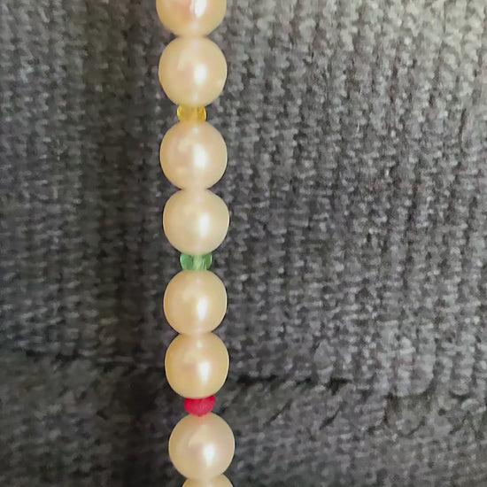 handcrafted pearl necklace with multigem accents